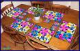 TM003MC-A3-jas-table-6pk-frangipani-madness-plumeria-flower-table-mat-colour-jantke-art-studio